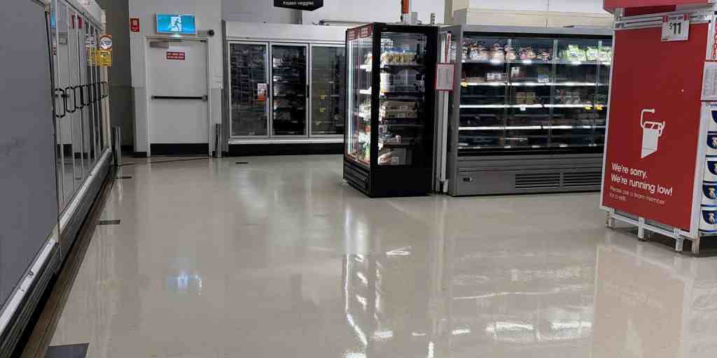 After – supermarket freezer aisle vinyl floor stripped and sealed